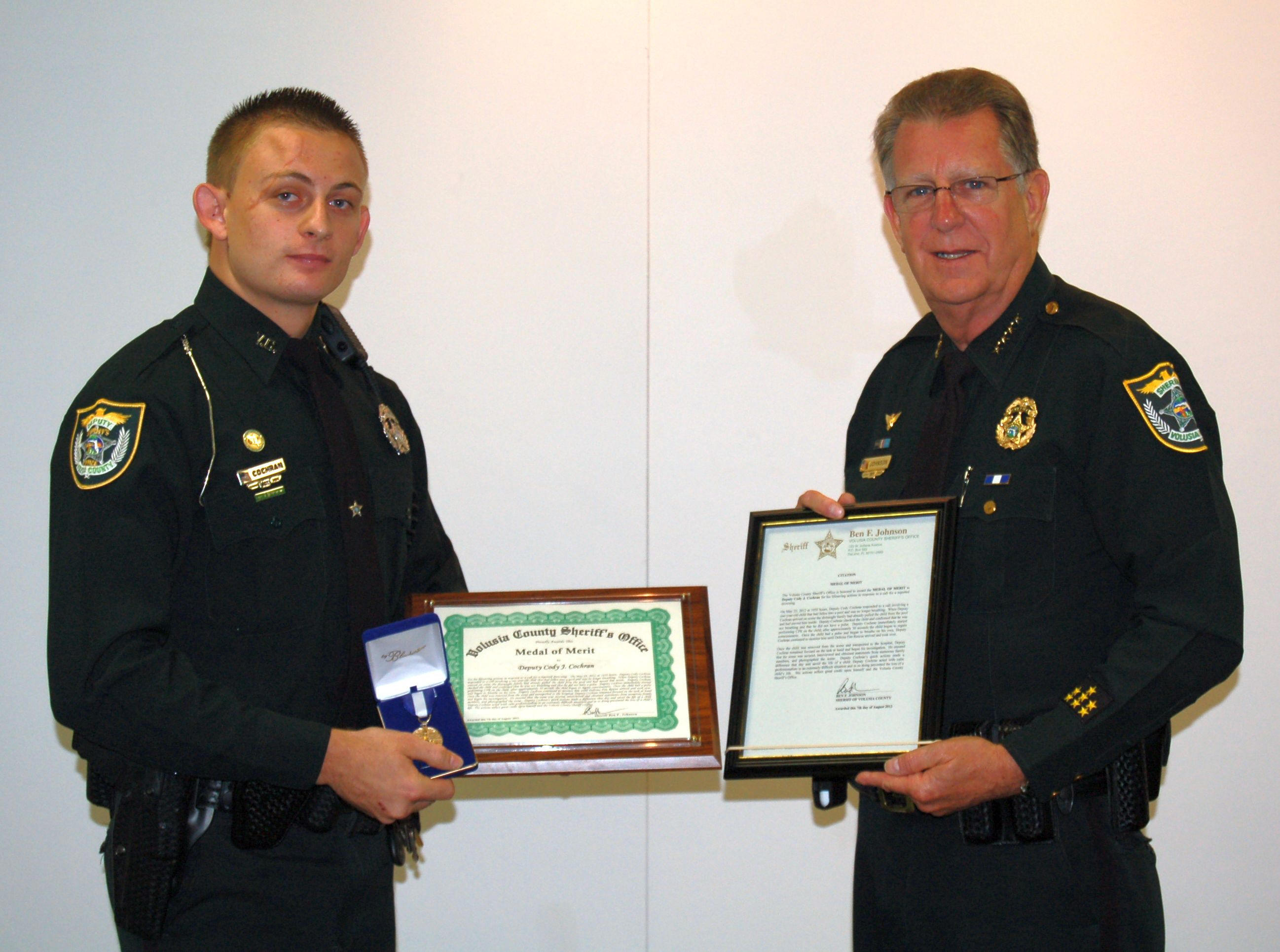 Sheriff Johnson Awards Medal To Baby-Saving Deputy Image